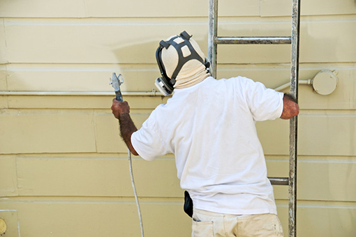 House Painter in Lutz FL Using Spray Paint