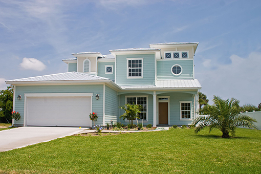 Exterior of Westchase Florida House Coated Blue by Local House Painters
