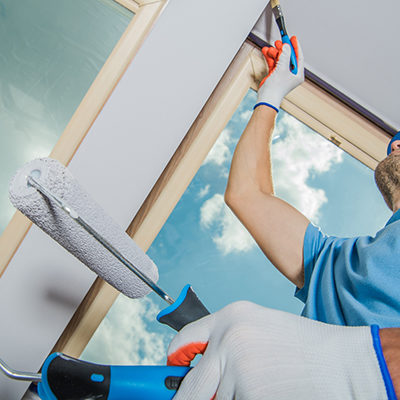 Painter Finishing the Interior of a House in Tampa Florida